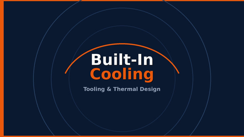 Large industrial metal stamp mold with curved internal cooling channels, navy and orange DC Additive Pros palette
